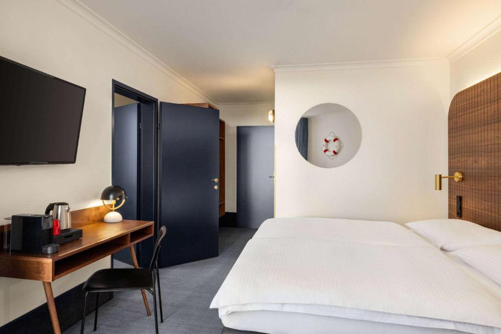 Postel nebo postele na pokoji v ubytování Vienna House by Wyndham Amber Baltic Miedzyzdroje