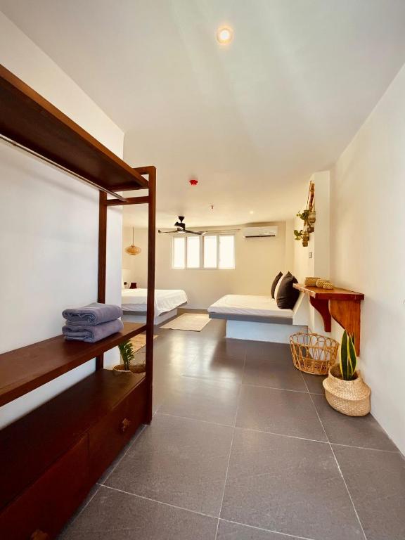 Voodi või voodid majutusasutuse Happiness Hostel Boracay toas