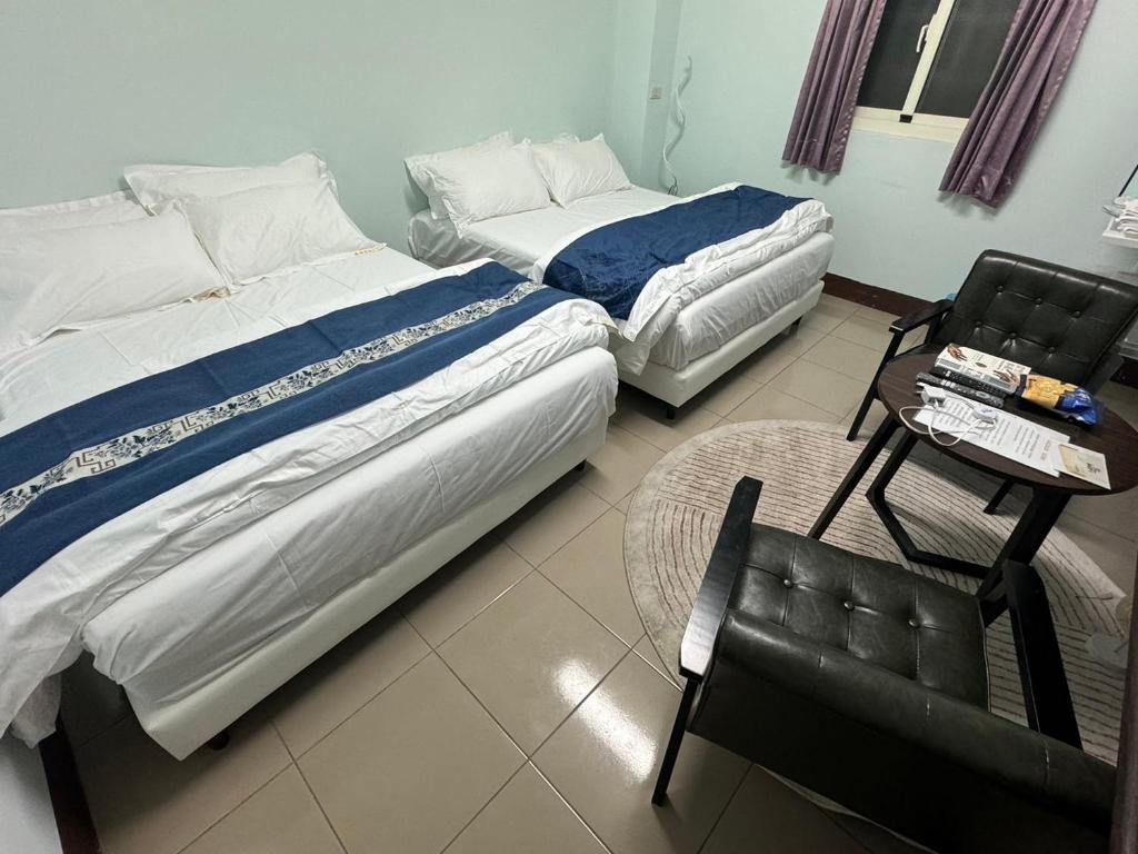 Postel nebo postele na pokoji v ubytování Lukang Hung-shiu Homestay