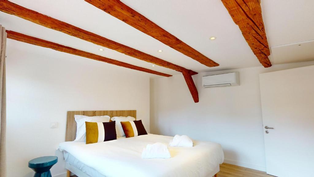 Postel nebo postele na pokoji v ubytování Résidence de l'ancien relais