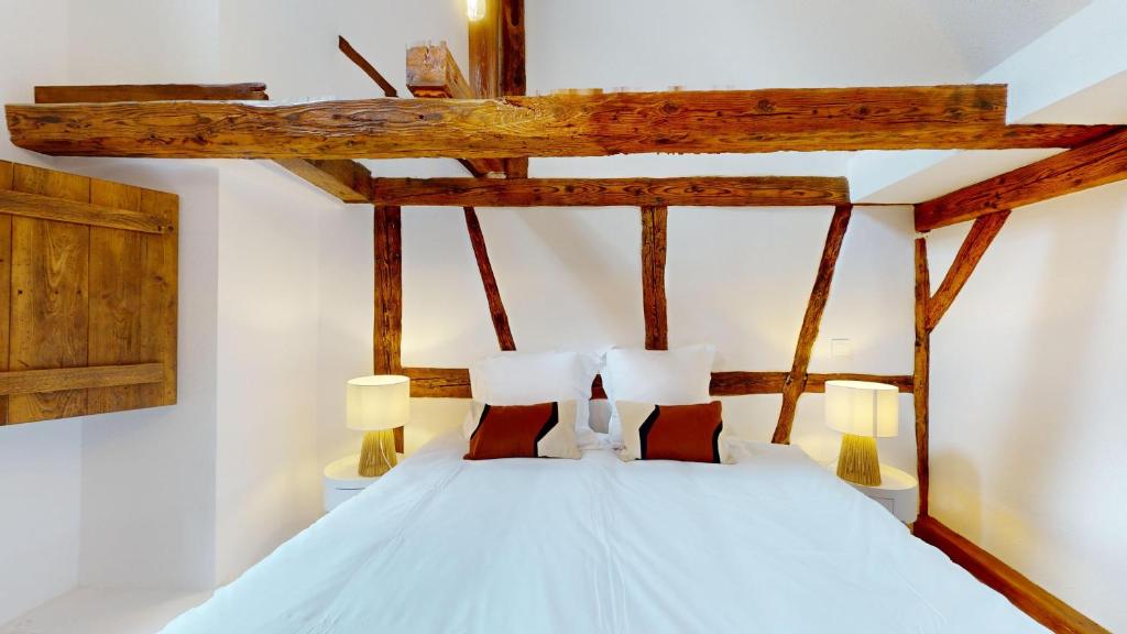 Postel nebo postele na pokoji v ubytování Résidence de l'ancien relais