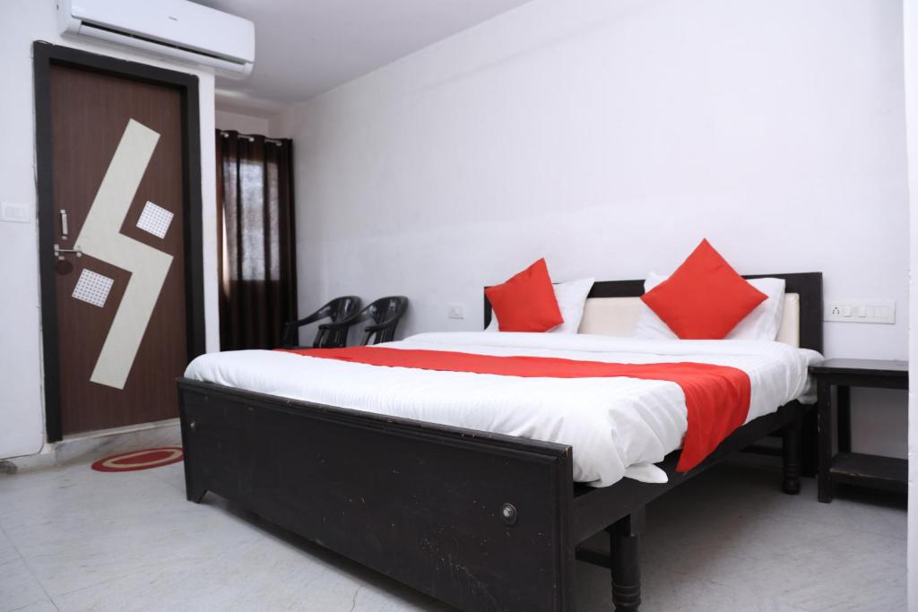 Кровать или кровати в номере Hotel Shiv Sagar Haveli