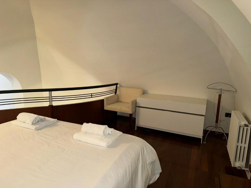 Postelja oz. postelje v sobi nastanitve Roberto Exclusive Suite