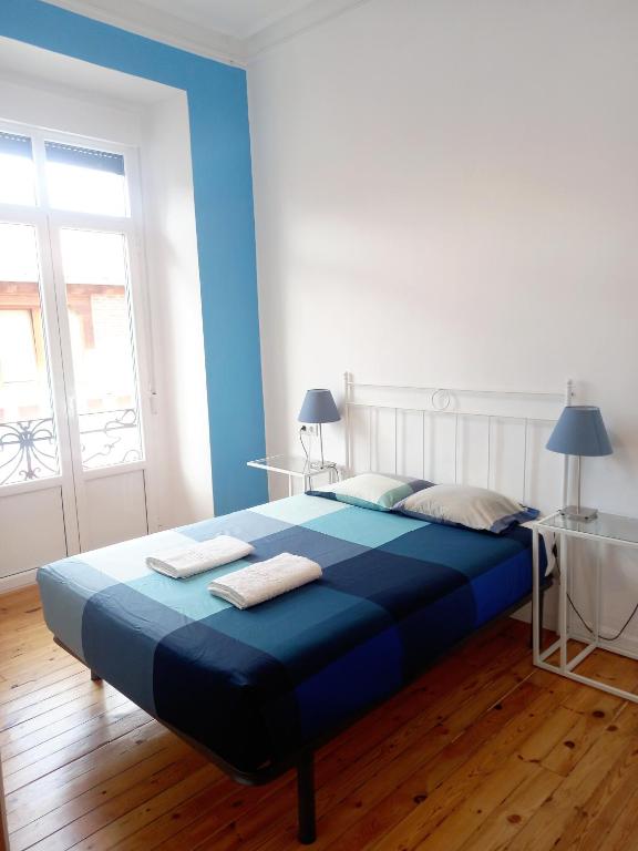 Posteľ alebo postele v izbe v ubytovaní Leon Hostel