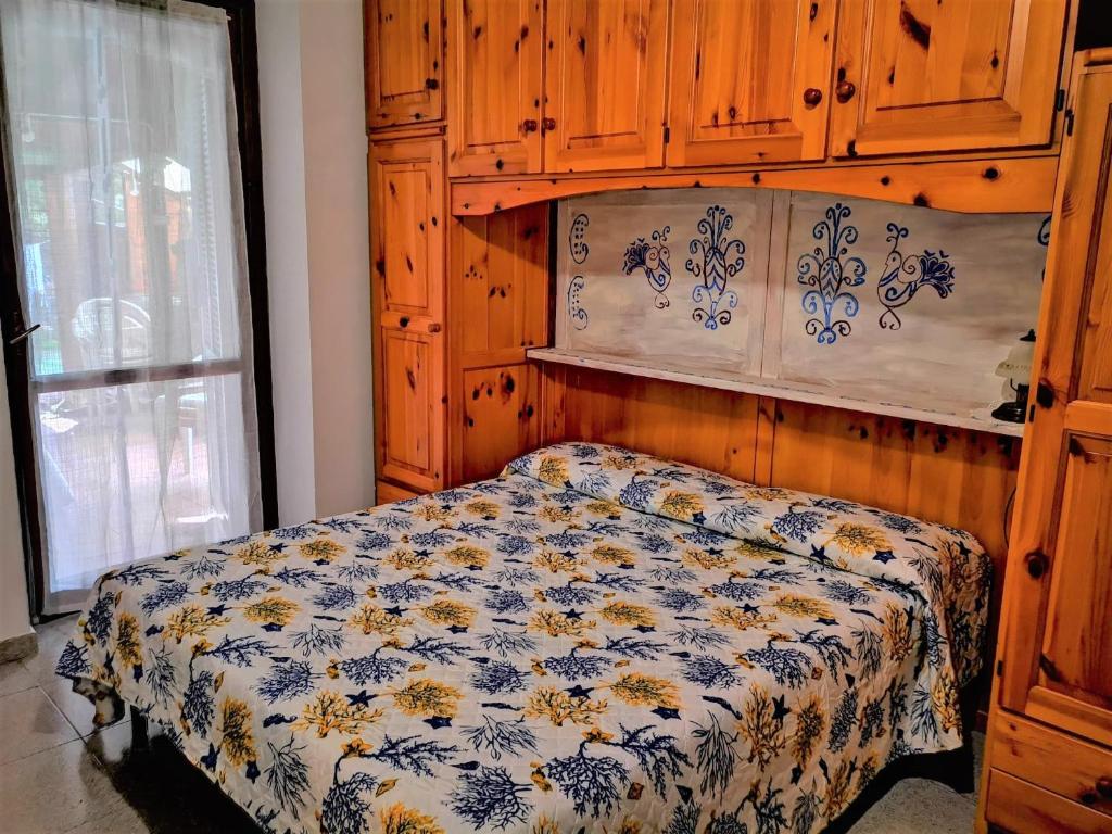 Ένα ή περισσότερα κρεβάτια σε δωμάτιο στο Villa Maga