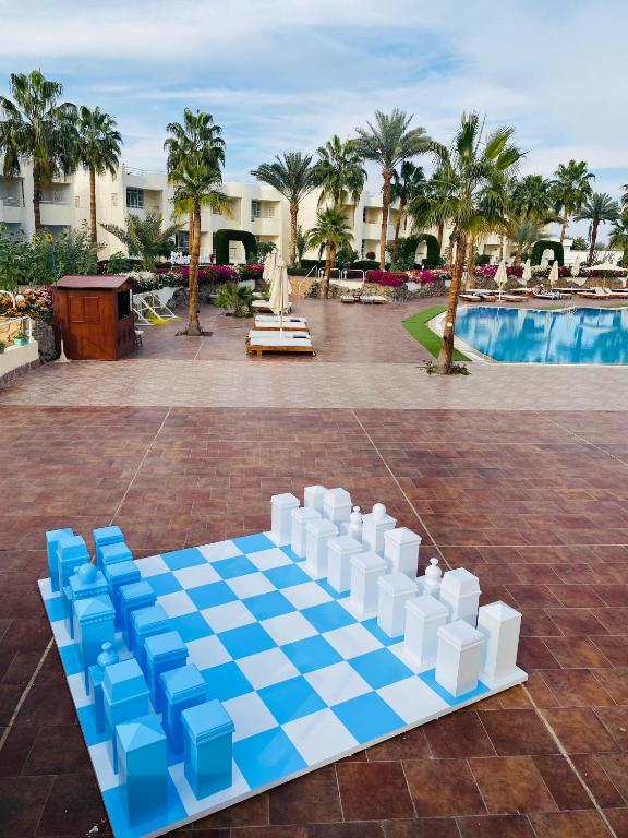 Bazén v ubytování Sharm Reef Hotel nebo v jeho okolí