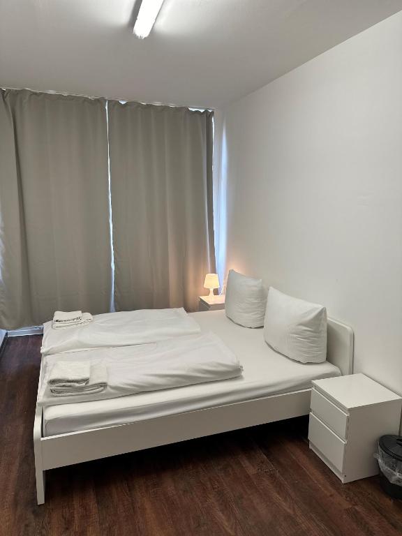 Postel nebo postele na pokoji v ubytování Potsdamer Inn