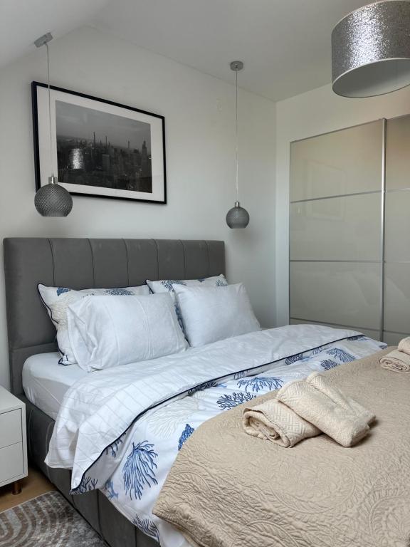 Llit o llits en una habitació de Apartman “Manhattan”