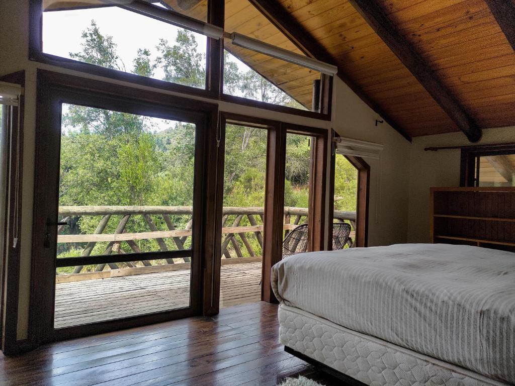 Postel nebo postele na pokoji v ubytování Tumuñan Lodge