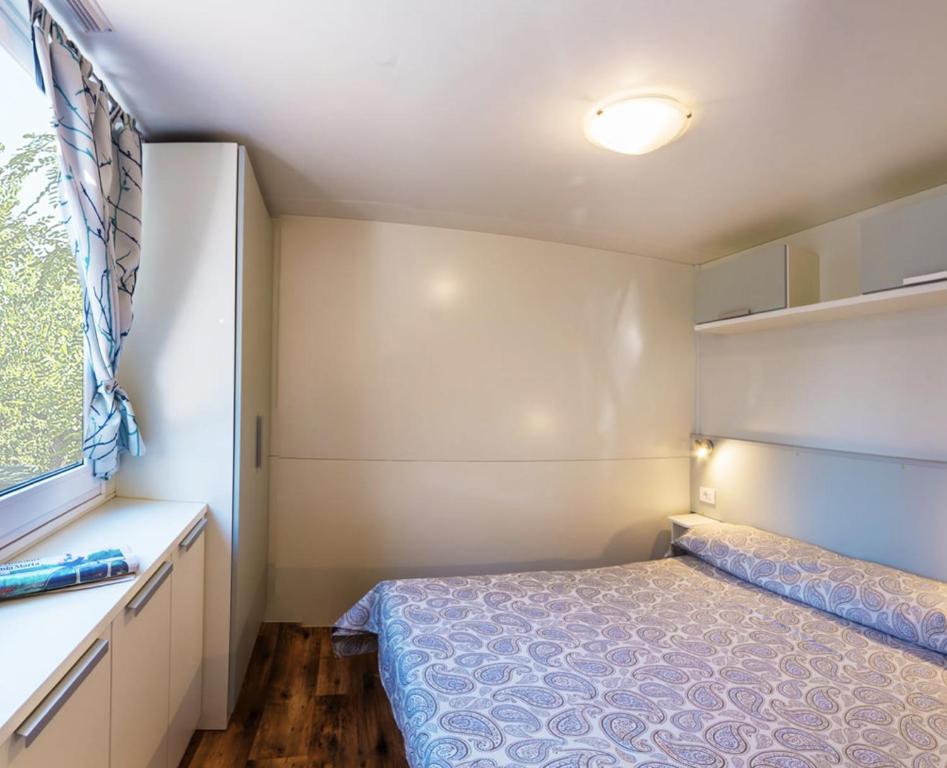 Postel nebo postele na pokoji v ubytování EUROCAMPINGPACENGO