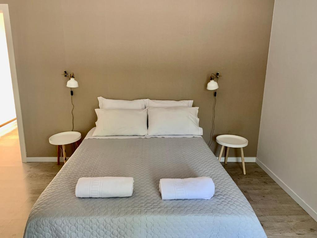 Uma cama ou camas num quarto em Casa Pitta Charm Villa
