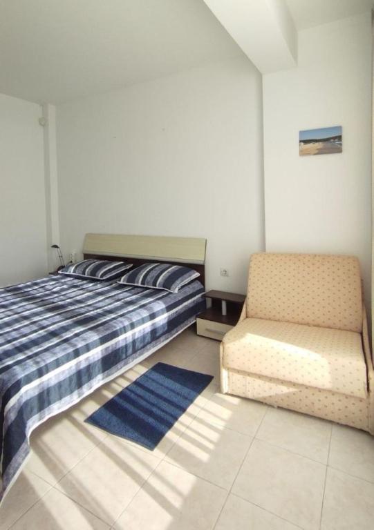 Postel nebo postele na pokoji v ubytování Sea view family apartment Saint Vlas