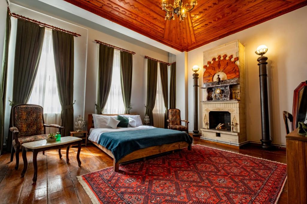 Postel nebo postele na pokoji v ubytování Nevalist Hotel