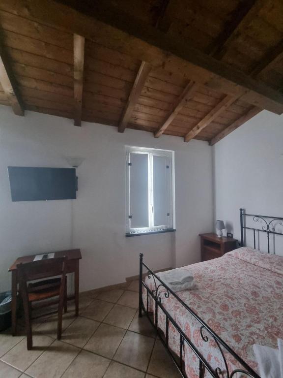 Postel nebo postele na pokoji v ubytování Hotel Paese Corvara