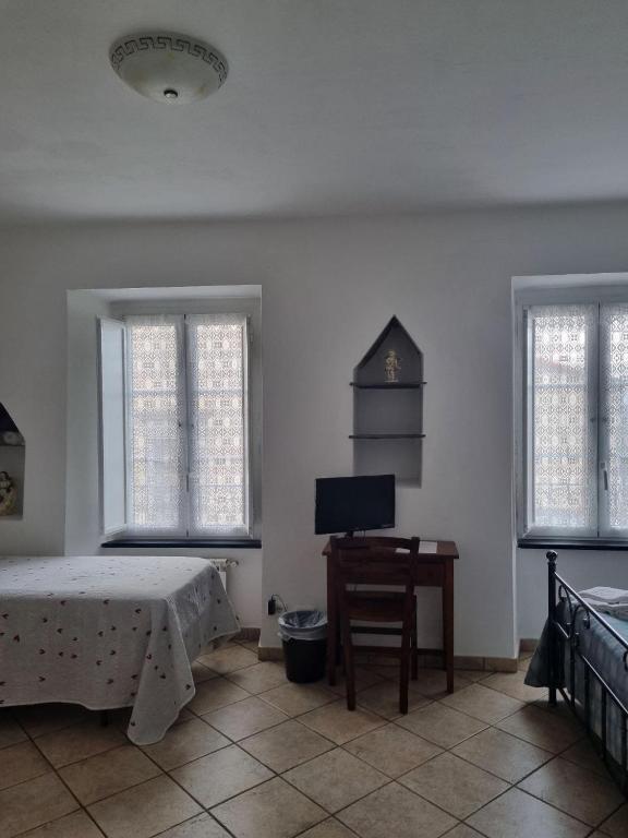 Postel nebo postele na pokoji v ubytování Hotel Paese Corvara