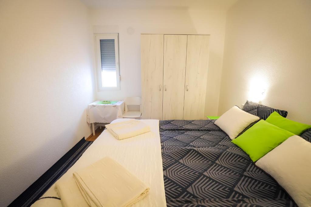 Postel nebo postele na pokoji v ubytování Kuća JEKA
