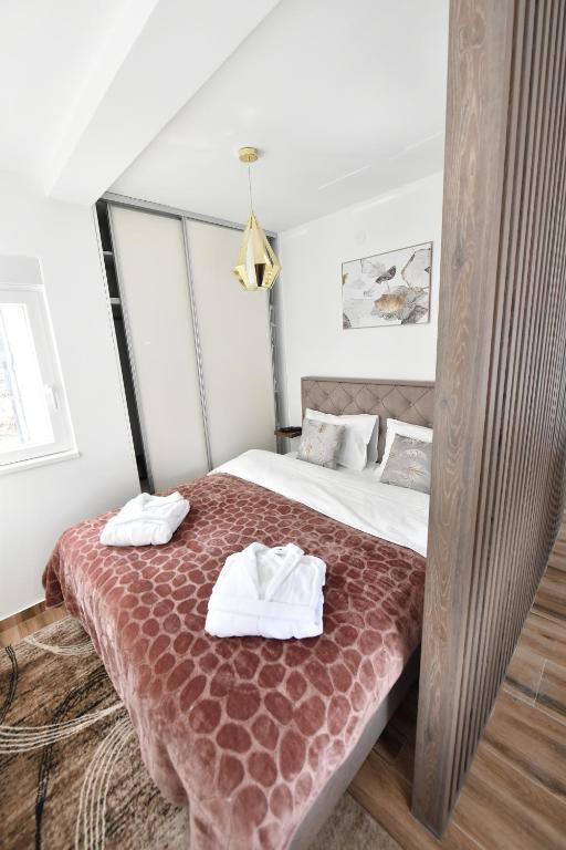 Una cama o camas en una habitación de Apartman Vuk Divčibare