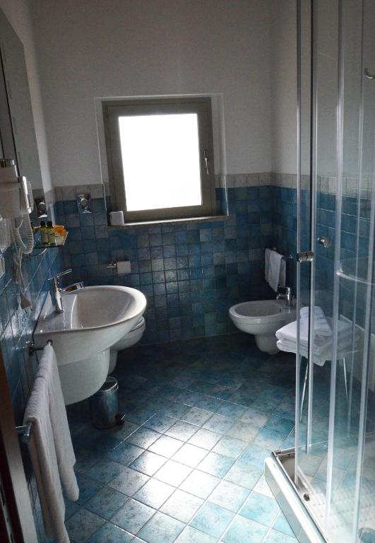Een badkamer bij Agriturismo Casale Degli Ulivi Alghero