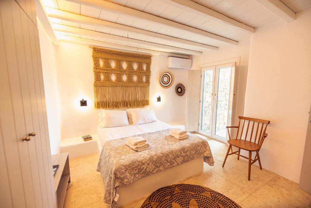 Posteľ alebo postele v izbe v ubytovaní Villa Poppy Mykonos