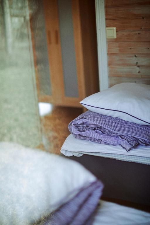 Postel nebo postele na pokoji v ubytování Valleviken Hotell