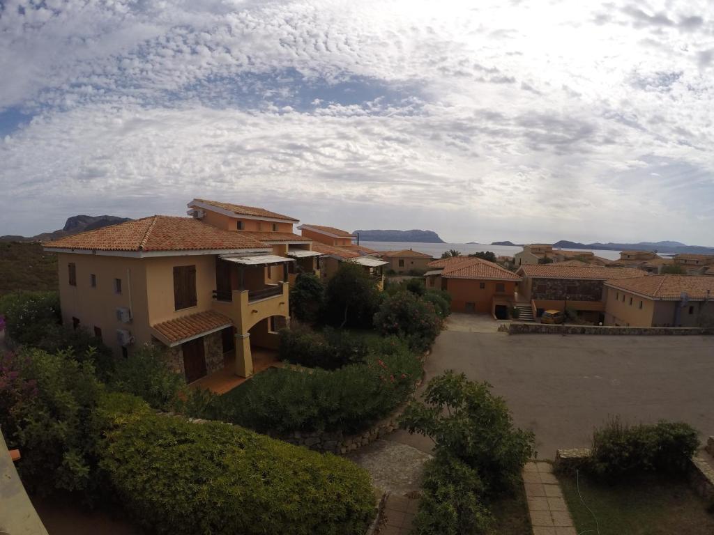 an overhead view of a village with houses at Residence Spiaggia Bianca in Golfo Aranci