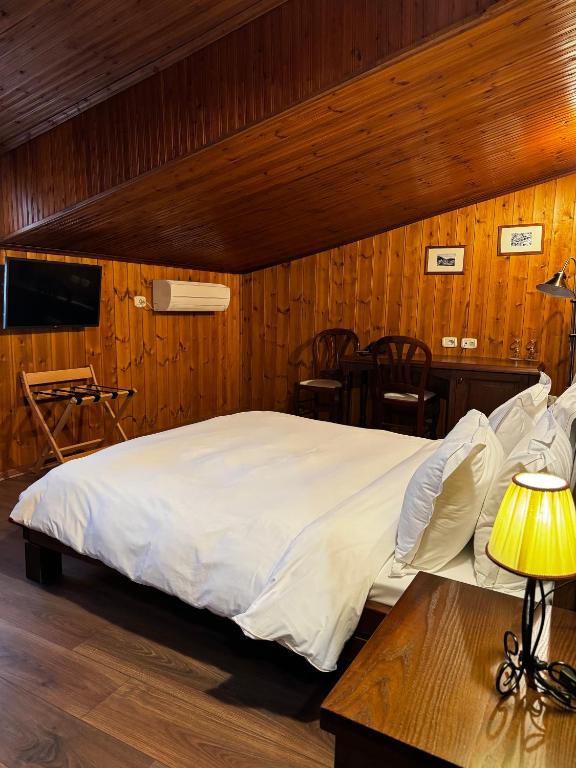 Letto o letti in una camera di Hotel Mangalemi