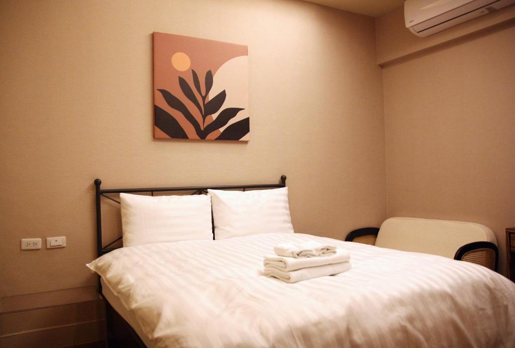 Katil atau katil-katil dalam bilik di 聖水洞民宿성수동