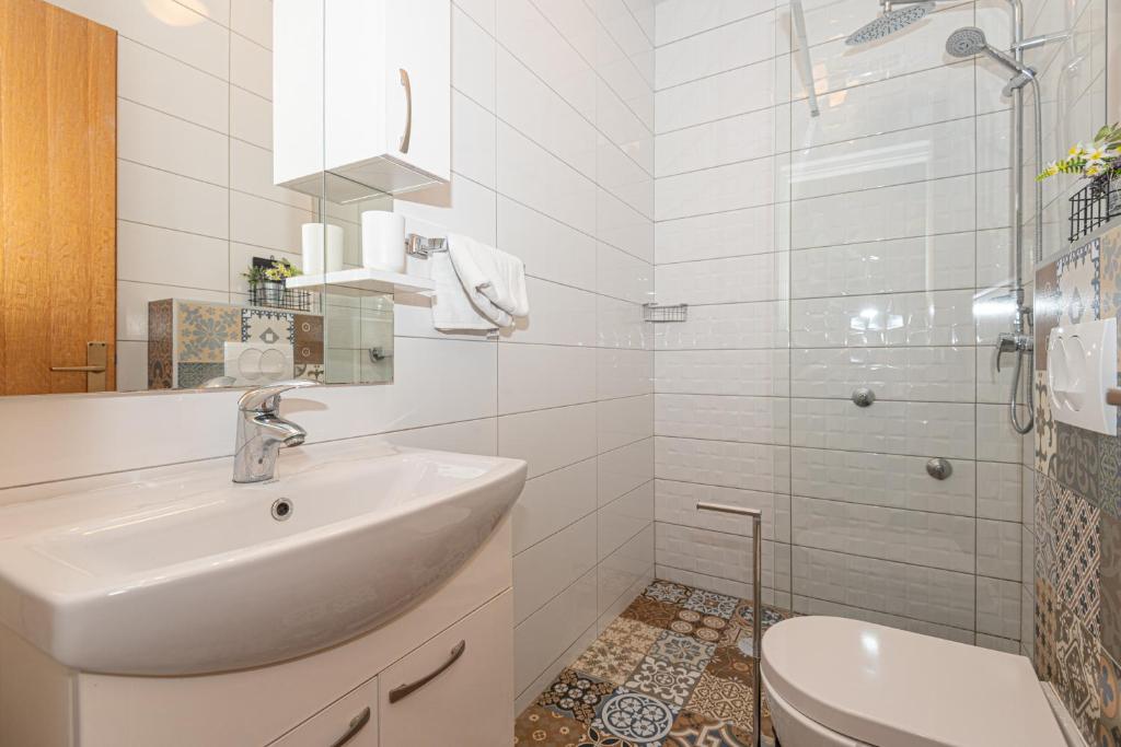Ванная комната в Apartments Lovrić