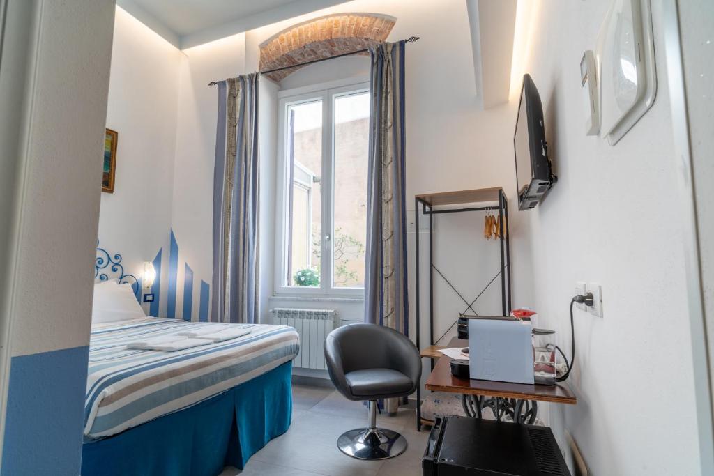 TV a/nebo společenská místnost v ubytování Teresa Rooms & Suites