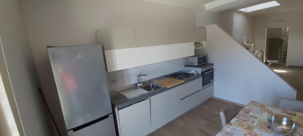 Kuchyň nebo kuchyňský kout v ubytování PACHINO - Casa nanu - un bilocale 75mq e un monolocale 40mq