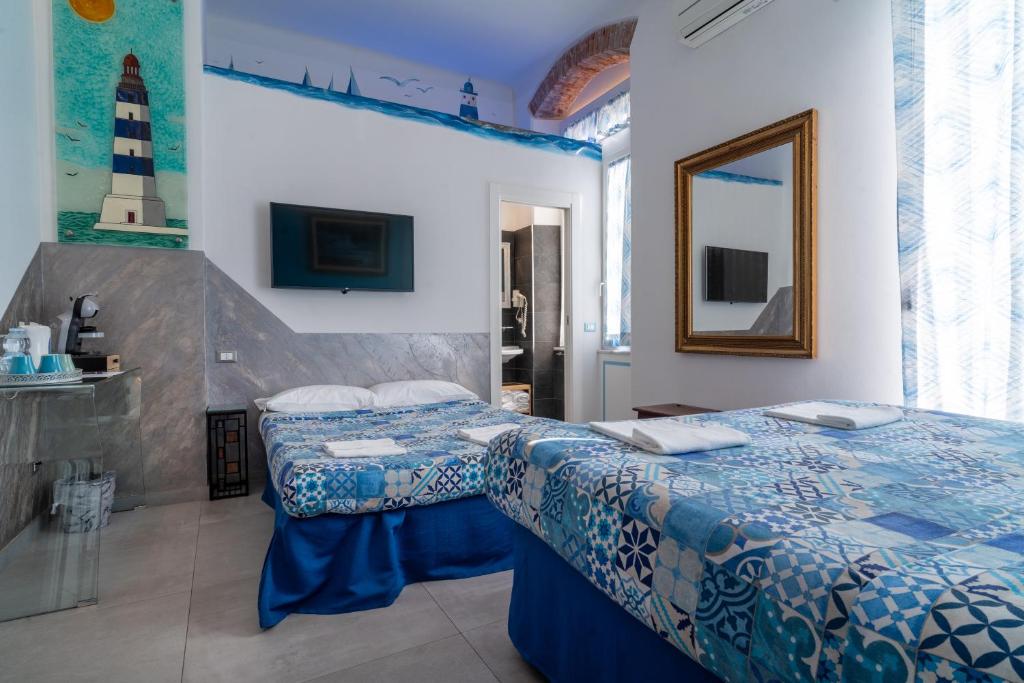 Postel nebo postele na pokoji v ubytování Teresa Rooms & Suites
