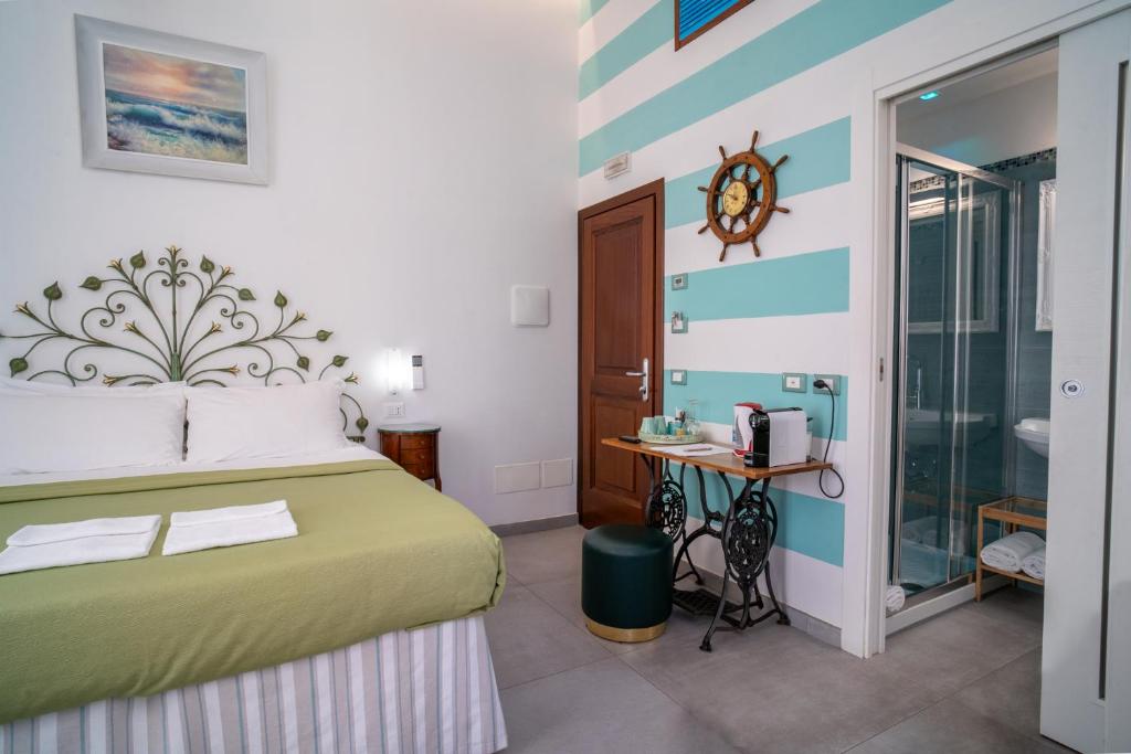 Postel nebo postele na pokoji v ubytování Teresa Rooms & Suites