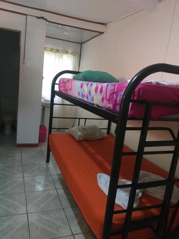 Postel nebo postele na pokoji v ubytování Downtown Montezuma Hostel