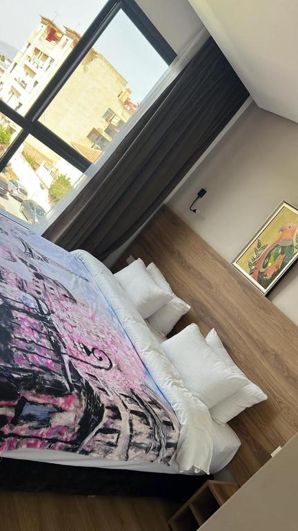 Postel nebo postele na pokoji v ubytování Hotel beaux arts