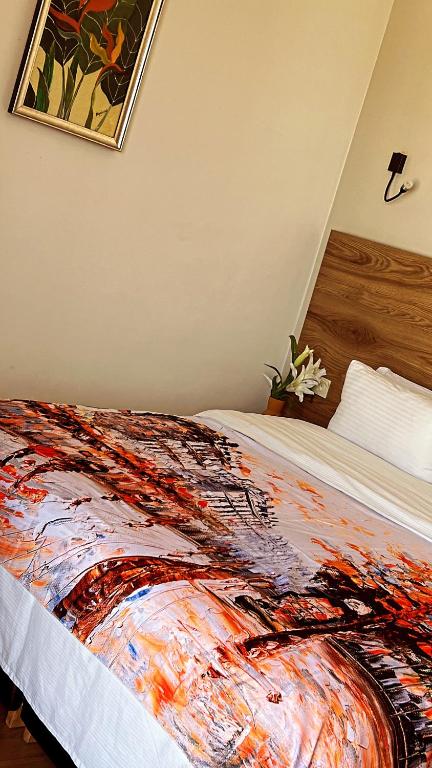 Postel nebo postele na pokoji v ubytování Hotel beaux arts