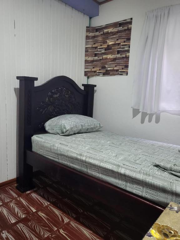 Postel nebo postele na pokoji v ubytování Downtown Montezuma Hostel