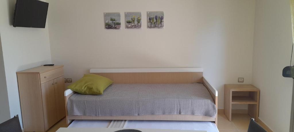 Postel nebo postele na pokoji v ubytování ioli