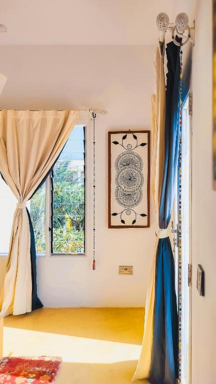 Postel nebo postele na pokoji v ubytování Casa Maridadi