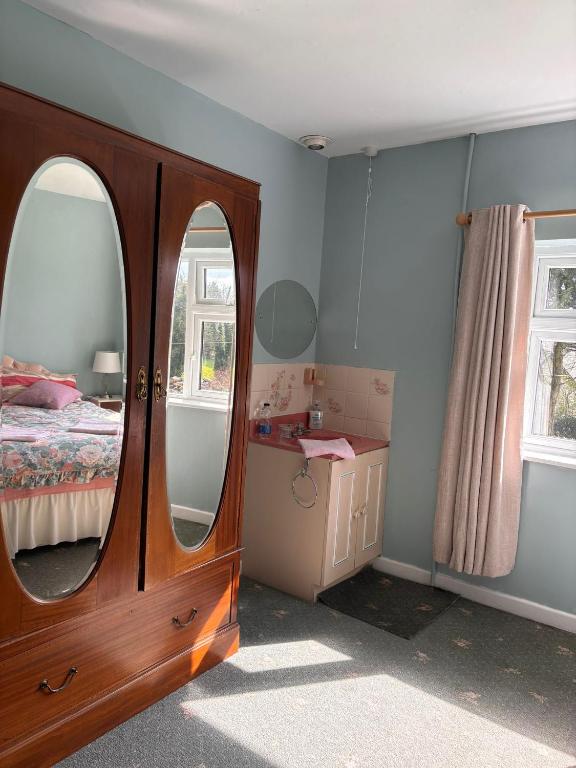Postel nebo postele na pokoji v ubytování Millbrook House