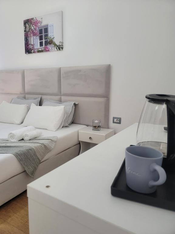 Postel nebo postele na pokoji v ubytování Hotel Myrtai - City Center