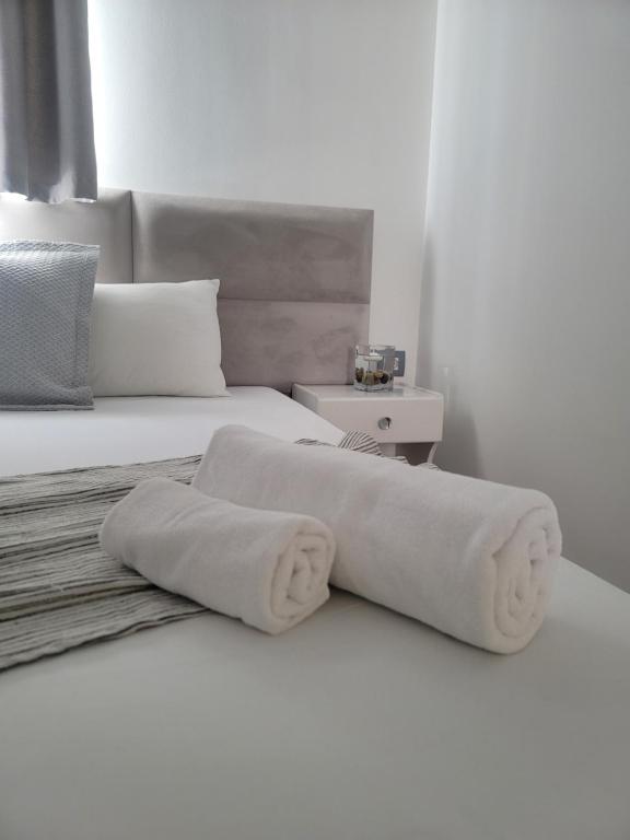 Postel nebo postele na pokoji v ubytování Hotel Myrtai - City Center