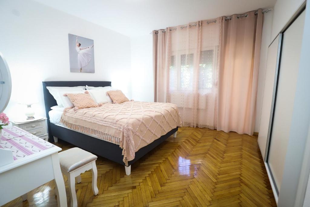 Postel nebo postele na pokoji v ubytování Kuća JEKA