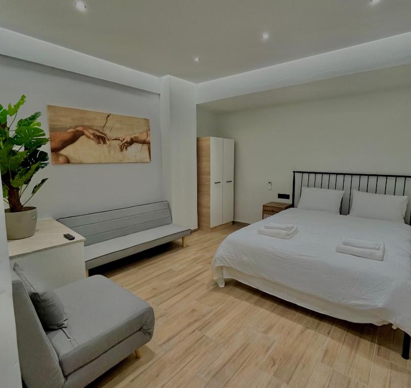 Ένα ή περισσότερα κρεβάτια σε δωμάτιο στο Meramvellou Living