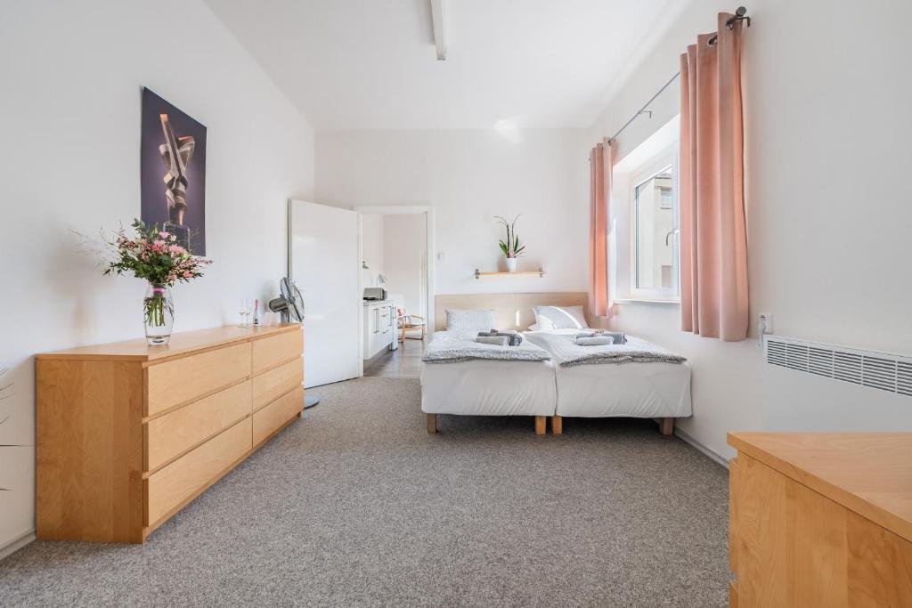 Letto o letti in una camera di Apartmány Rozárka Turnov
