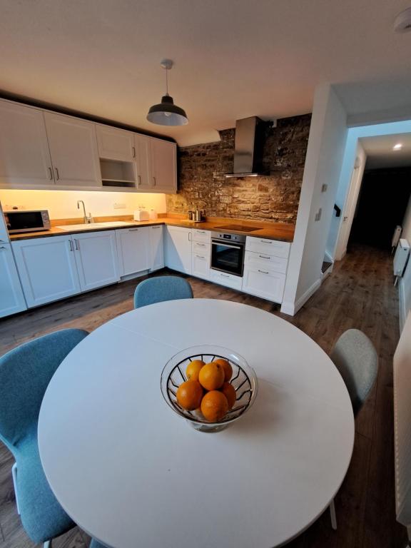 Kuchyň nebo kuchyňský kout v ubytování Darrell Cottage