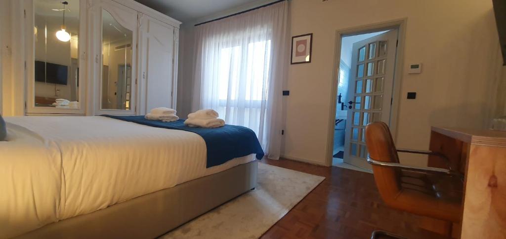 Postel nebo postele na pokoji v ubytování Azurara Guesthouse
