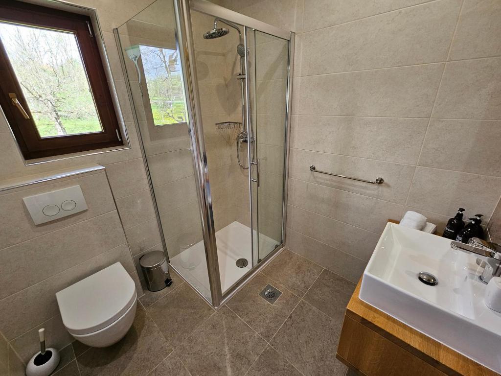 Koupelna v ubytování Apartments Woodnotes