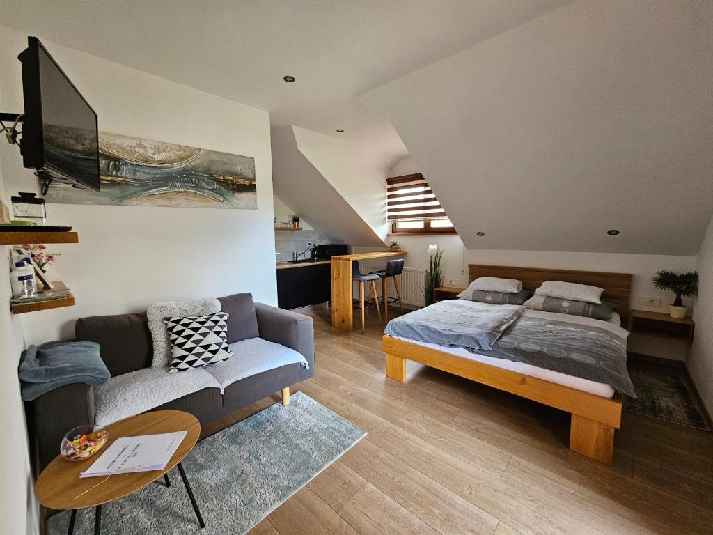 Postel nebo postele na pokoji v ubytování Apartments Woodnotes