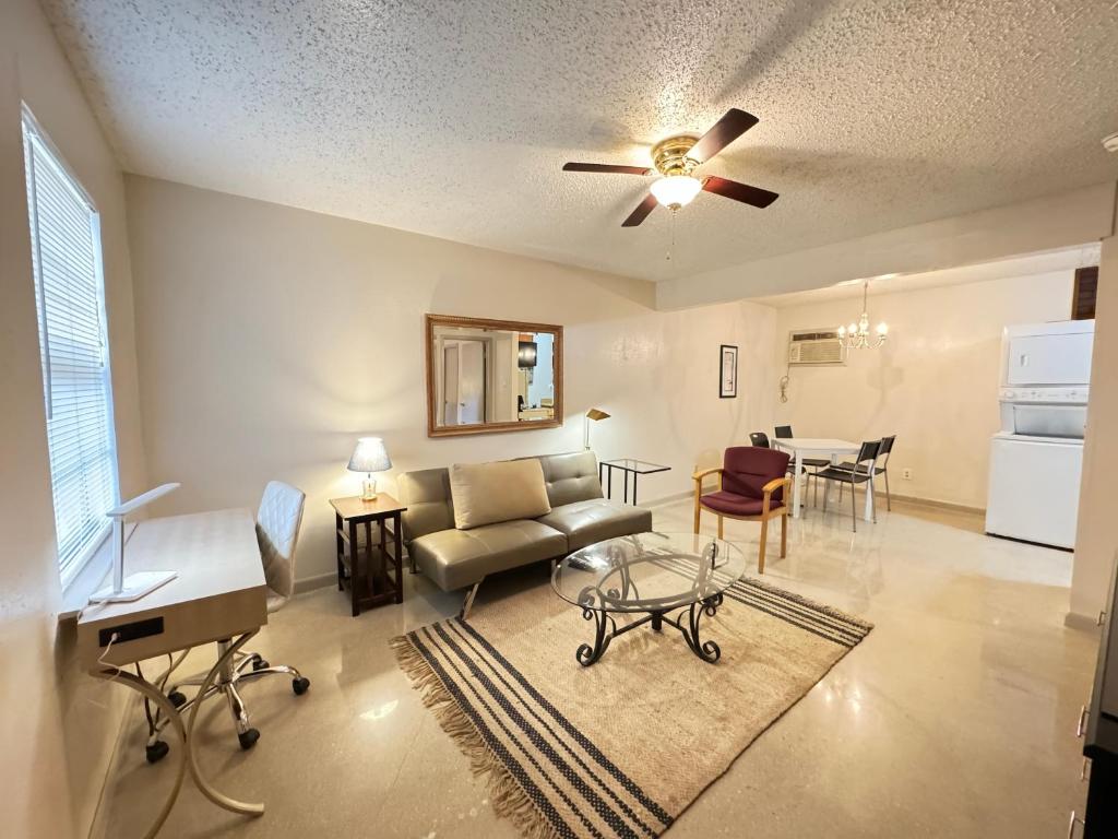 a living room with a couch and a table at 1326-#3 downtown comfy & clean 1bedroom unit in San Antonio