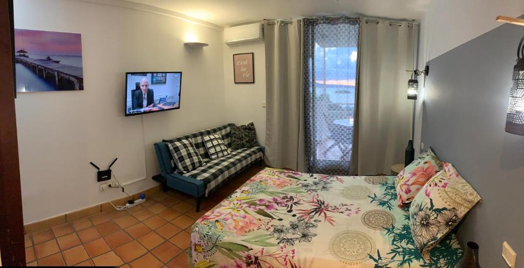 Postel nebo postele na pokoji v ubytování La Fraîche Rosé